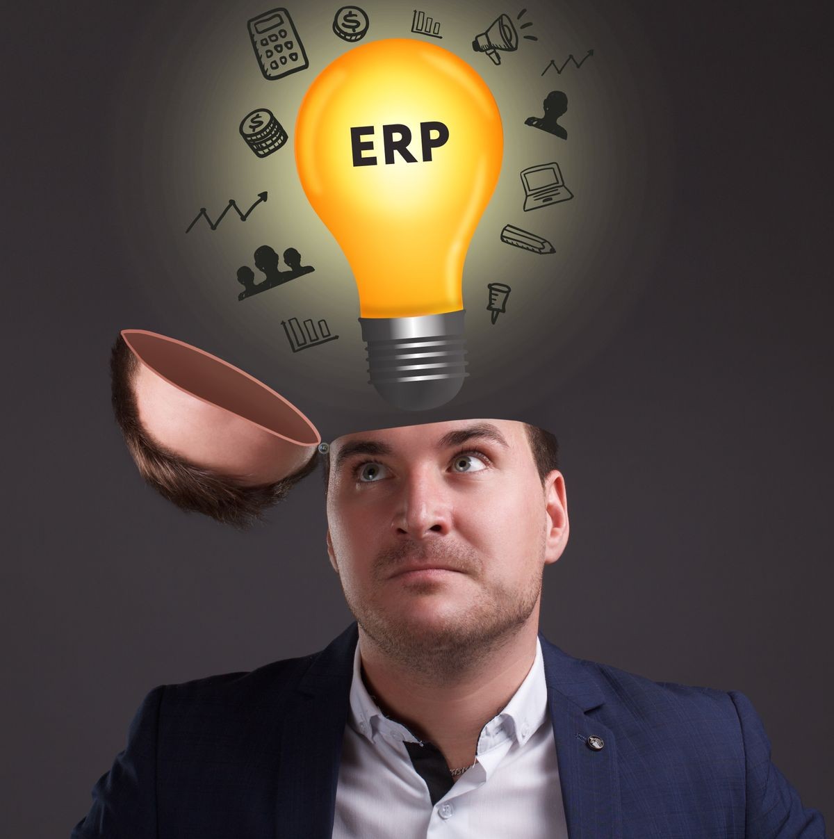 The concept of business, technology, the Internet and the network. A young businessman thinks about the work process: ERP